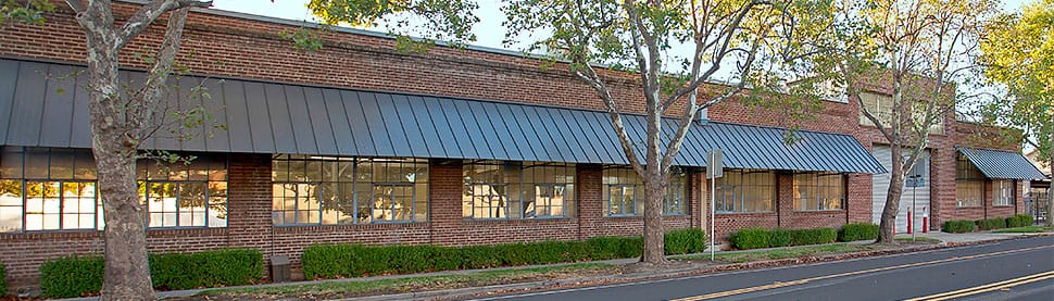 Metal Awning shading windows at Caltrans Division of Equipment on R Street