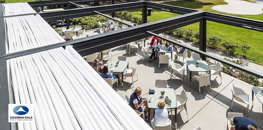 KE pergola install with the textile roof open to the sky.