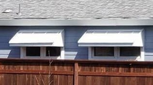 Residential metal window awnings.