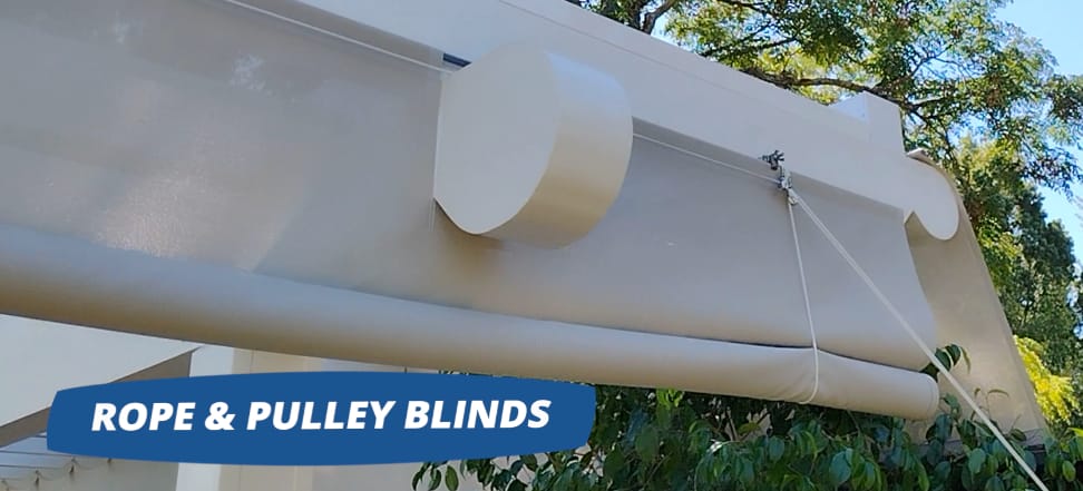 Outdoor rope and pulley blinds on a pergola install